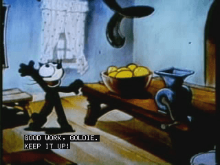 古い時代のアニメのフレーム。 "Good work, Goldie. Keep it up!" というクローズドキャプション付き。